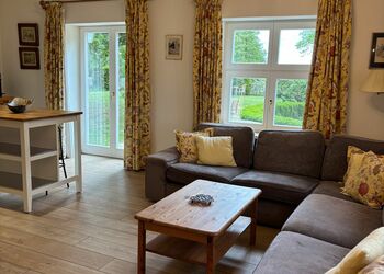 Living room apartment Terrassenblick Foto © Pia Boni